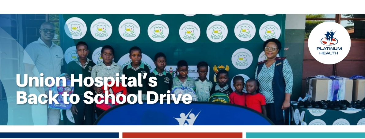 Union Hospital back to school drive with Platinum Health team and children receiving supplies