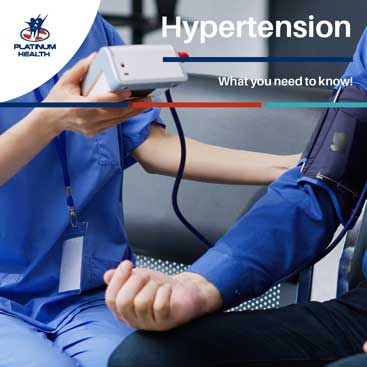 Healthcare professional measuring a patient’s blood pressure with a digital monitor for hypertension awareness